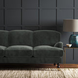 Green eco velvet upholstery fabric on a sofa