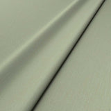 Sample of a green woven fabric.