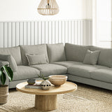 Sofa covered in a boucle fabric in Aluminium
