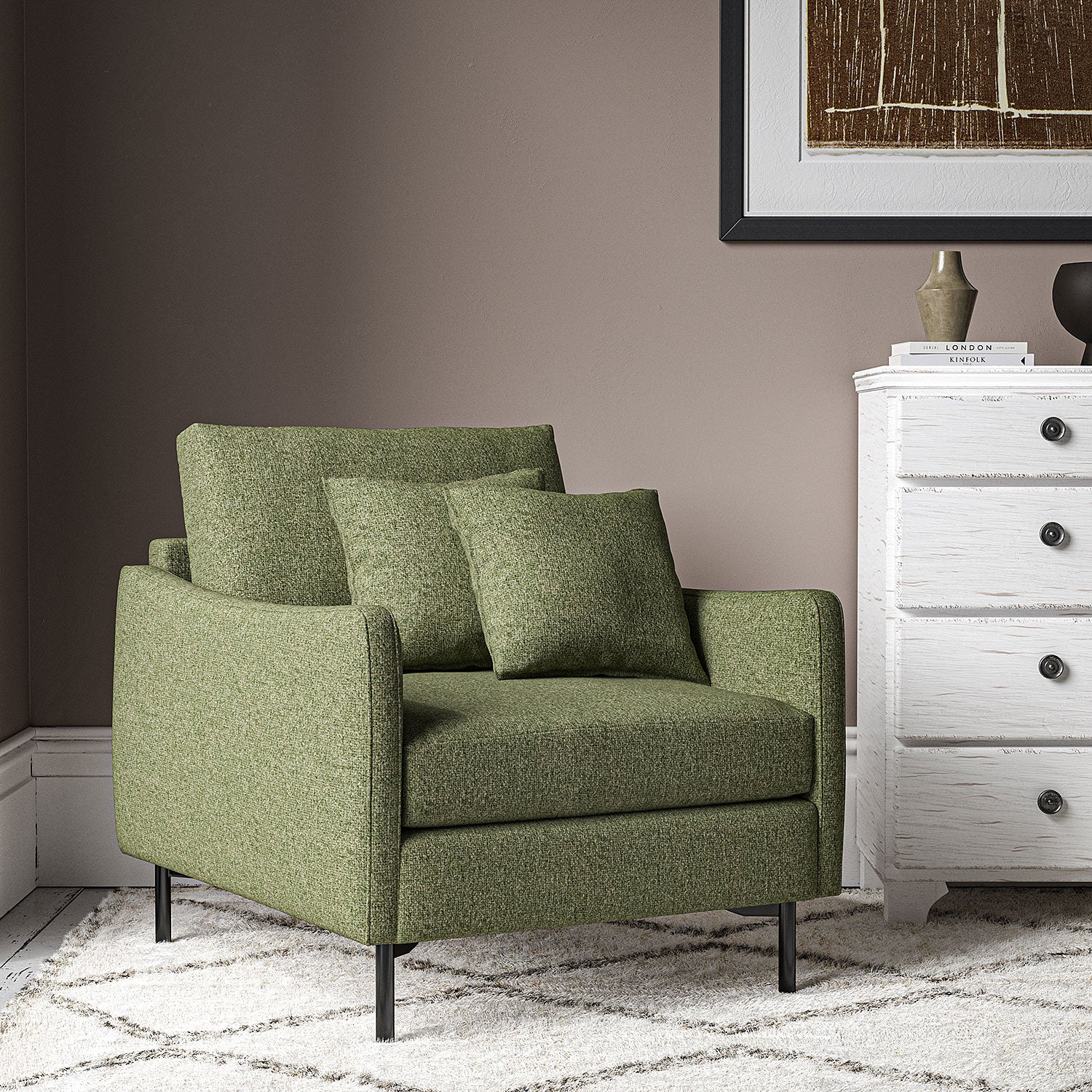 Chair covered in a boucle fabric in Winter Moss