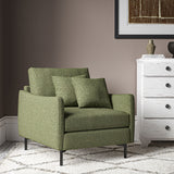 Chair covered in a boucle fabric in Winter Moss