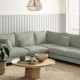 Sofa covered in a boucle fabric in Sea Salt