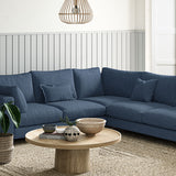 Sofa covered in a boucle fabric in Indigo
