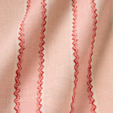 Printed linen fabric sample – a bold blocks of colour in this inviting stripe are softened with a painterly finish in pink, red and white