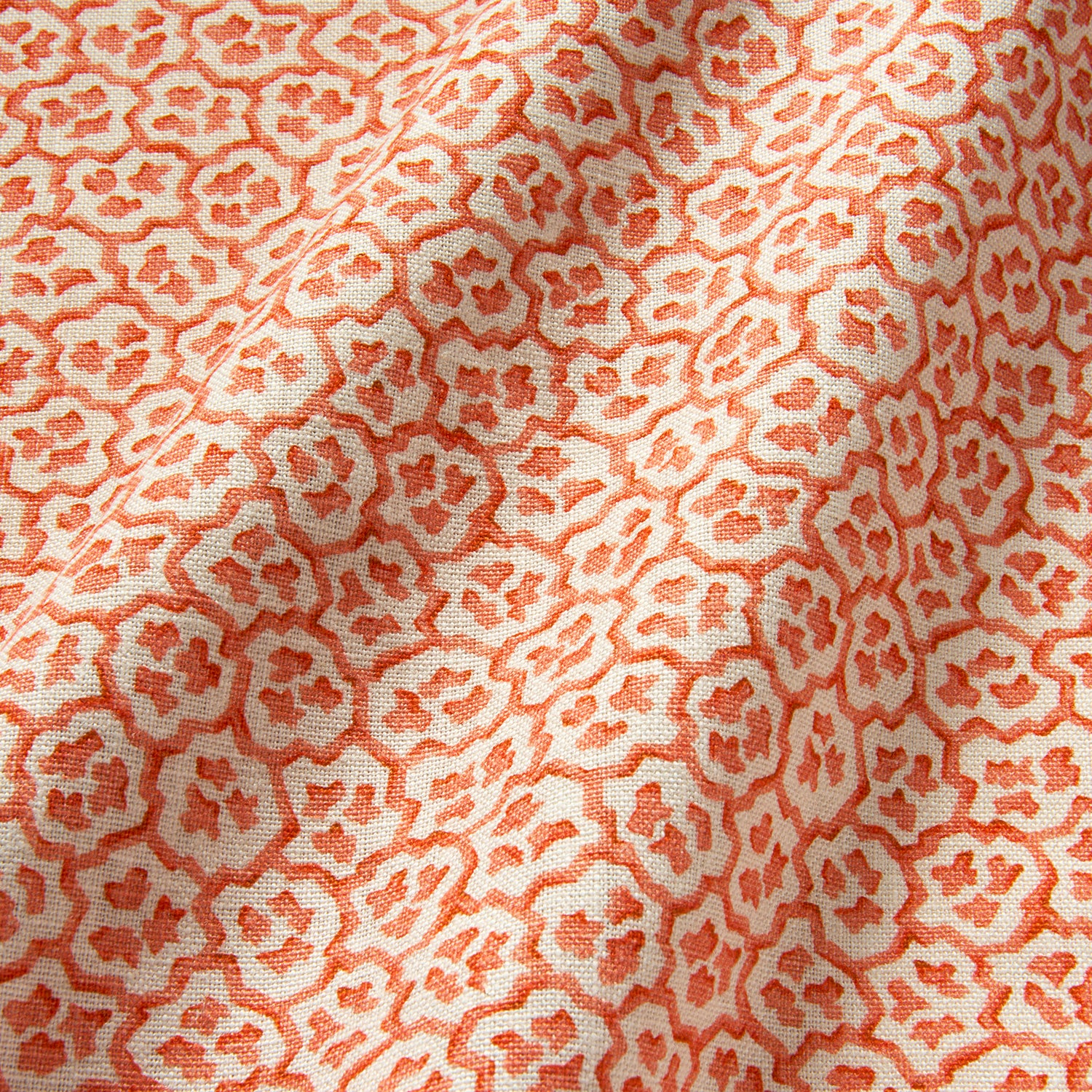 Printed linen fabric sample – a handy block print pattern in red and cream 