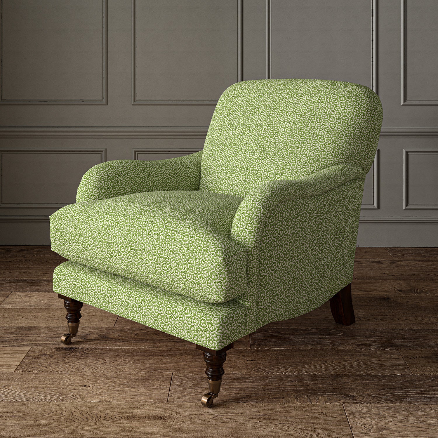 Printed linen fabric – a handy block print pattern in green and cream – on an armchair