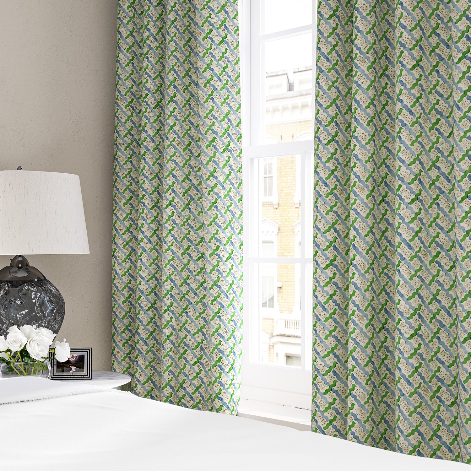 Linen curtains with a contemporary lattice design in green, blue, cream and white 