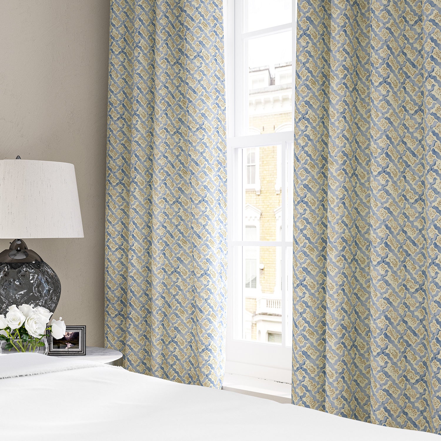 Linen curtains with a contemporary lattice design in blue, cream and white 