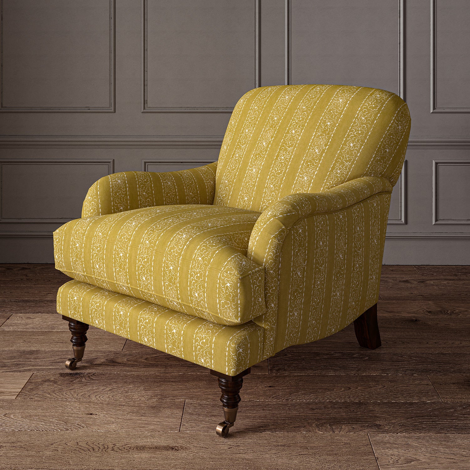 Printed linen fabric – a delicate pattern of moons and star-like dots in yellow and cream – on an armchair