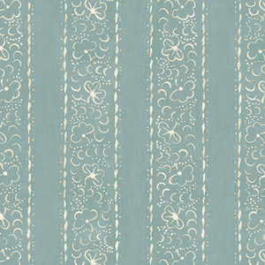 Printed linen fabric sample – a delicate pattern of moons and star-like dots in blue and cream