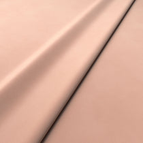 Fabric swatch of a pink velvet upholstery fabric