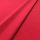 Fabric swatch of a pink velvet upholstery fabric