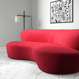 Sofa upholstered in a pink velvet upholstery fabric