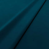 Fabric swatch of a blue velvet upholstery fabric