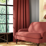 Living room featuring a sofa and curtains in a plain terracotta eco-friendly fabric