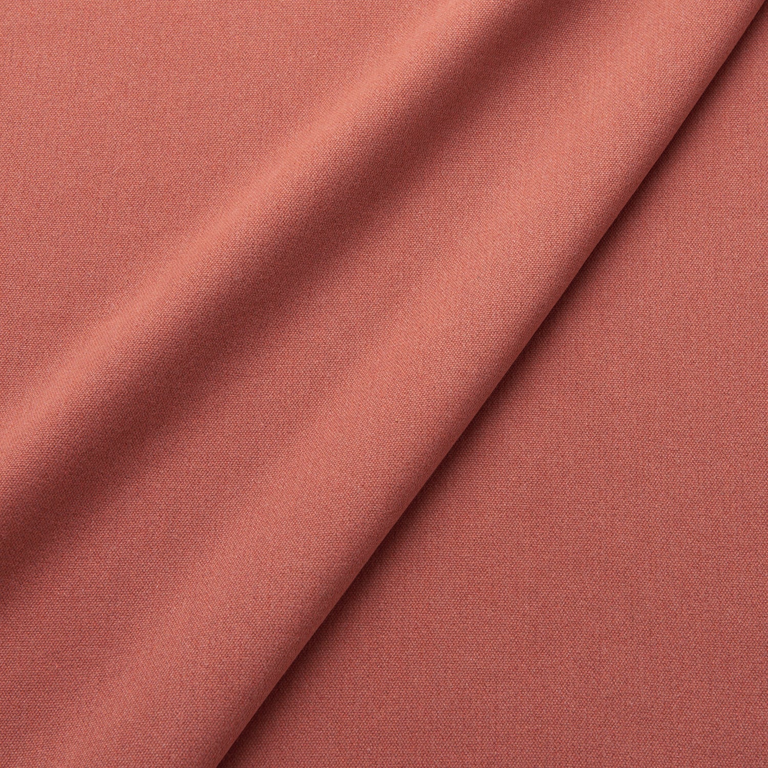 Fabric swatch of a eco-friendly plain terracotta fabric for curtains and upholstery