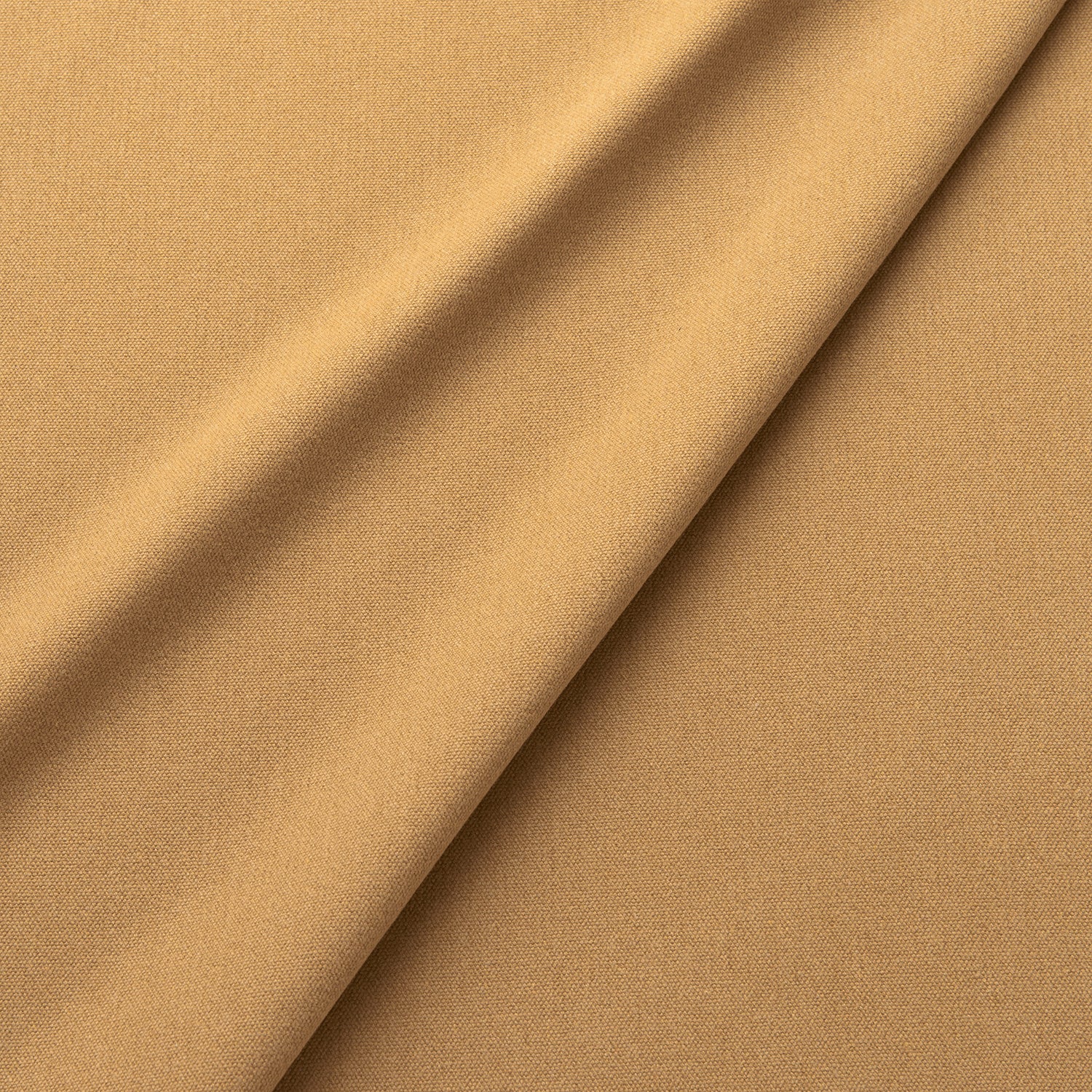 Fabric swatch of a eco-friendly plain yellow fabric for curtains and upholstery