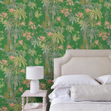 Bedroom with a tropical wallpaper in emerald green with exotic, floral blossoms intertwined with bamboo.