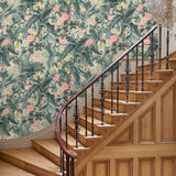 Hallway with tropical wallpaper featuring a lush design.