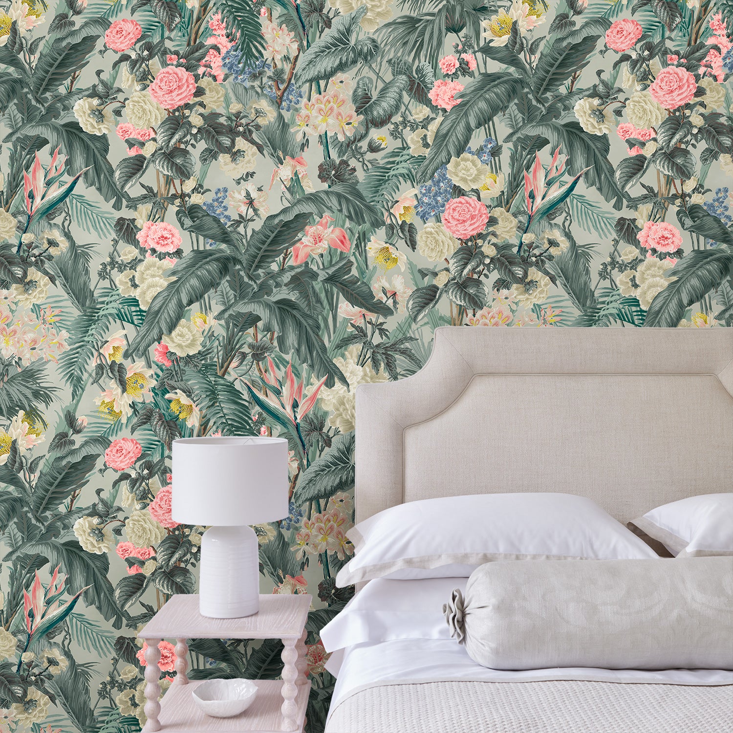 Bedroom with tropical wallpaper featuring a lush design.