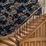 Inspired by a Japanese kimono, this designer wallpaper features an enchanting pattern of large abstract clouds. 