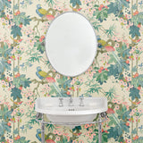Bathroom featuring a floral wallpaper with exotic birds.