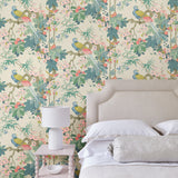 Bedroom featuring a floral wallpaper with exotic birds.