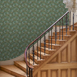 Capturing the beauty of the forest floor, this designer wallpaper features leaves and flowers.