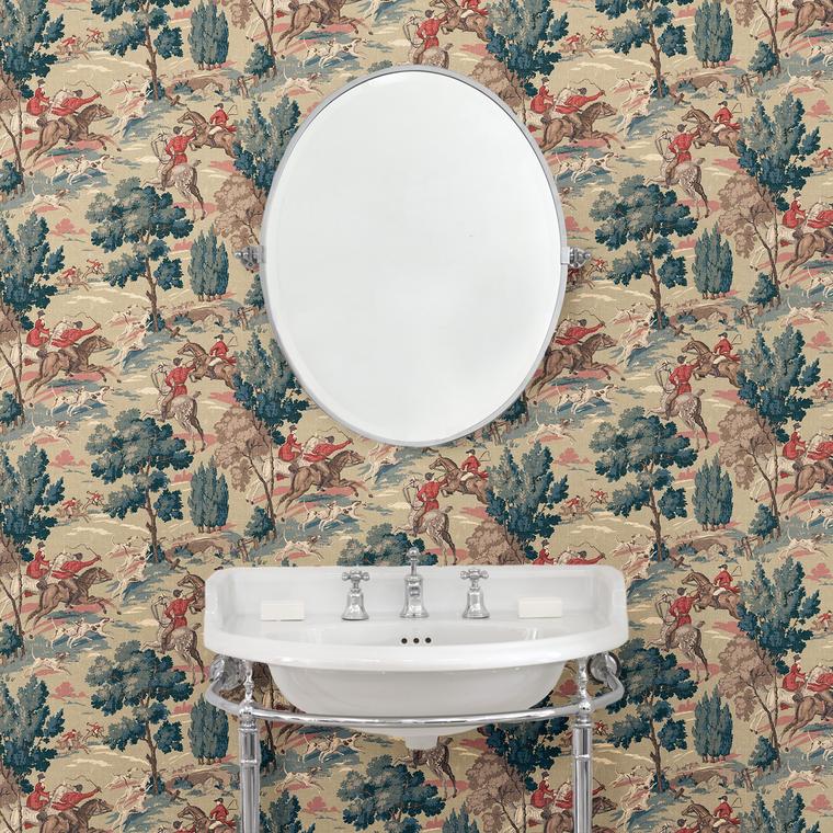 Cloakroom showcasing a designer wallpaper featuring the British hunt in sage.