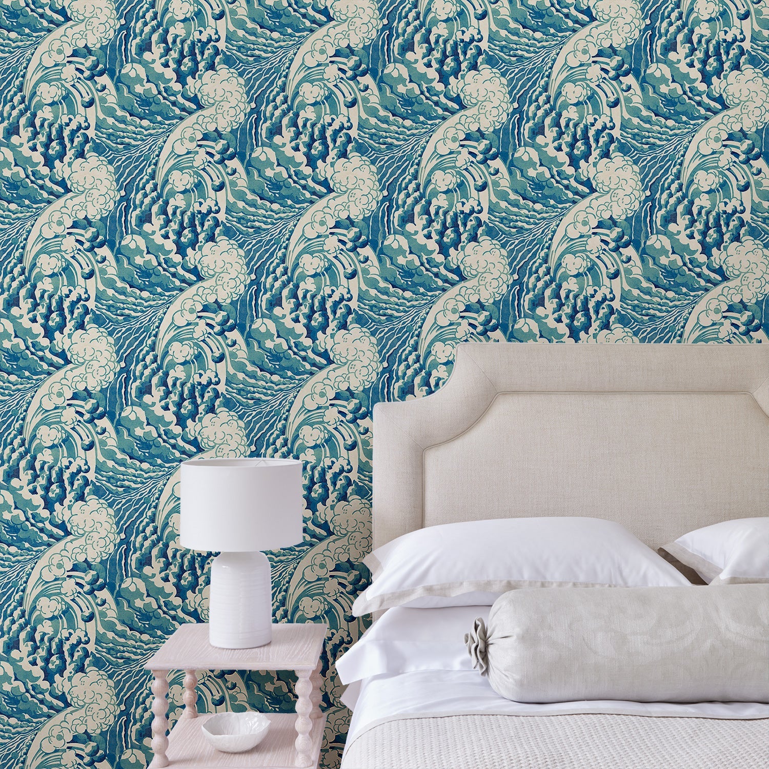 Bedroom with stylish abstract wallpaper featuring dramatic, undulating waves.