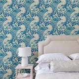 Bedroom with stylish abstract wallpaper featuring dramatic, undulating waves.