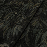 Sample of a printed velvet fabric showcasing stylised wisteria in green and brown