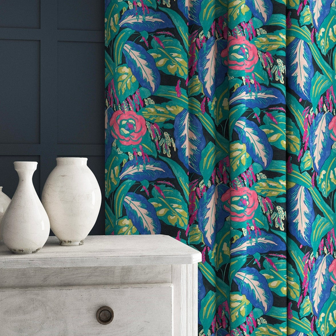 Velvet curtains in a floral-style printed velvet fabric in blues and greens.