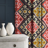 Velvet curtains in a henna kilim pattern.