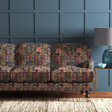 Sofa covered in a printed velvet fabric based on a classic Persian rug design.